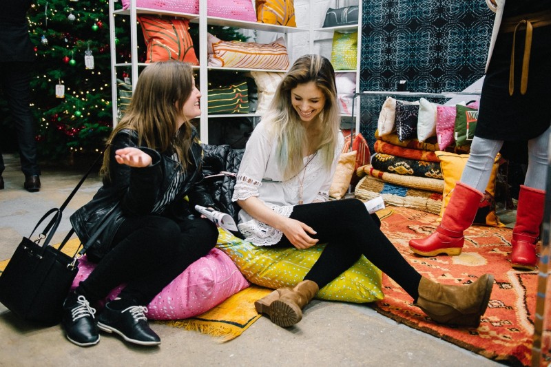 Shoppers on Caryn Cramer pillows at Lab 1270 in Union Market by Joy Asico